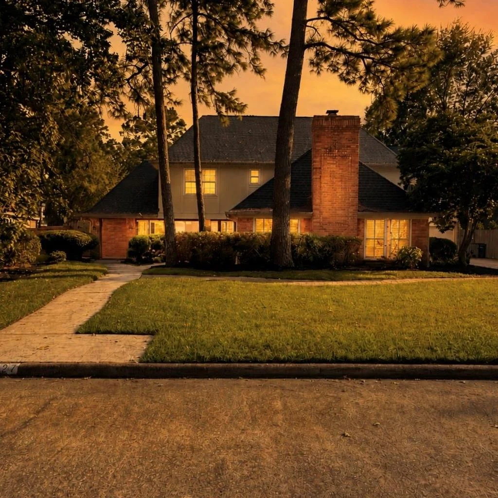 Front exterior of 9527 Enstone Circle at dusk