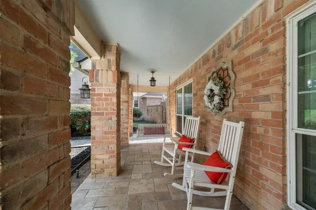 Covered front porch at 9527 Enstone Circle