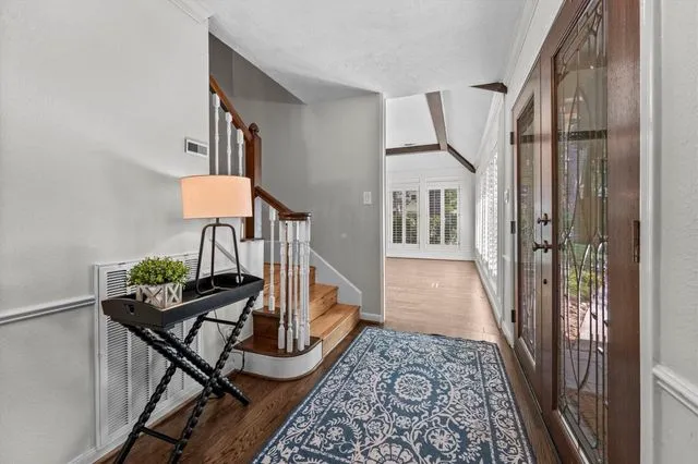 Entry hall and staircase at 9527 Enstone Circle